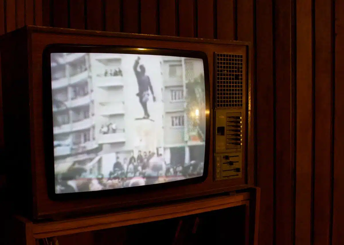 a television with a picture of a man on it